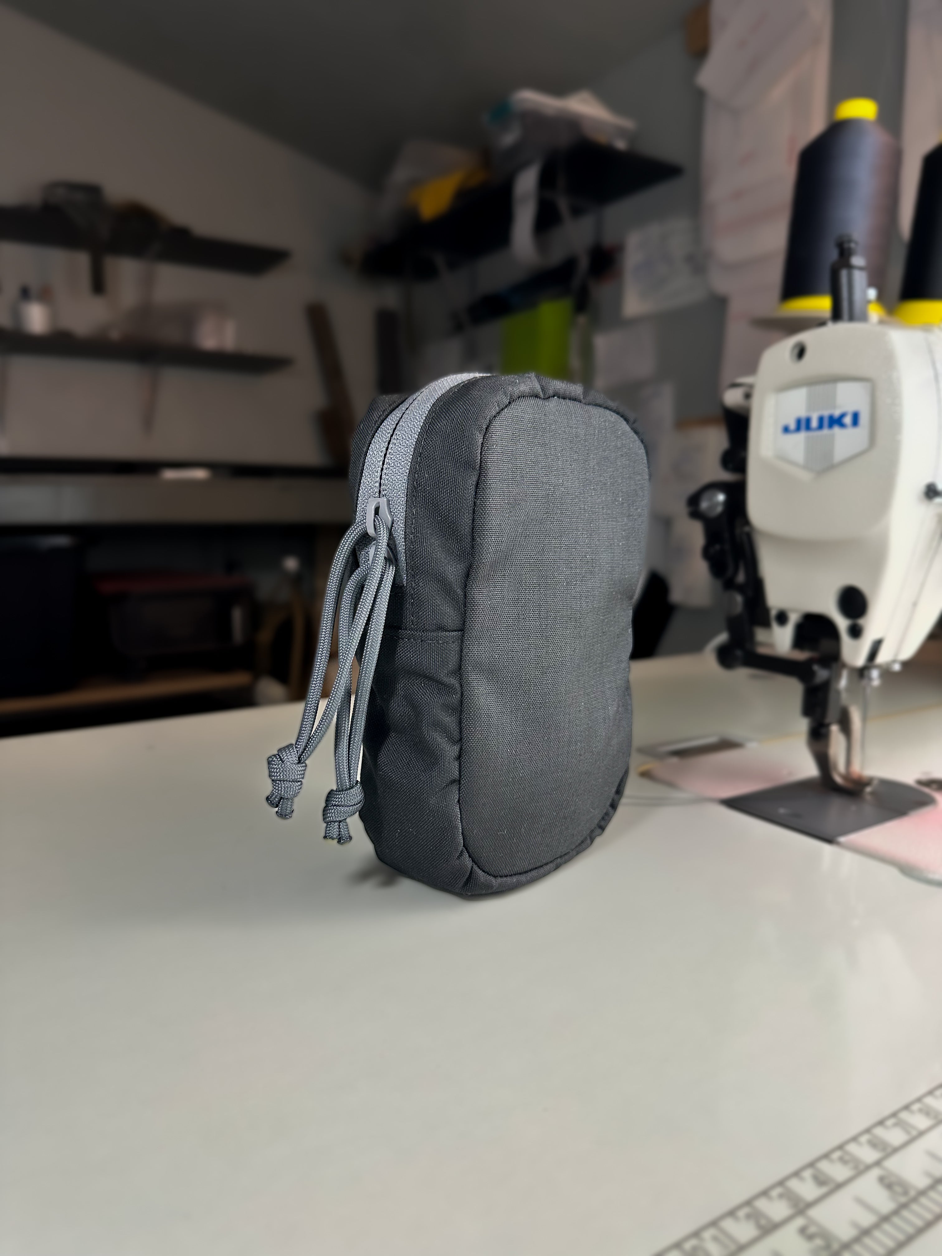 Modular pouch attached to backpack MOLLE Utility pouch Ruckmule mfg company general purpose pouch