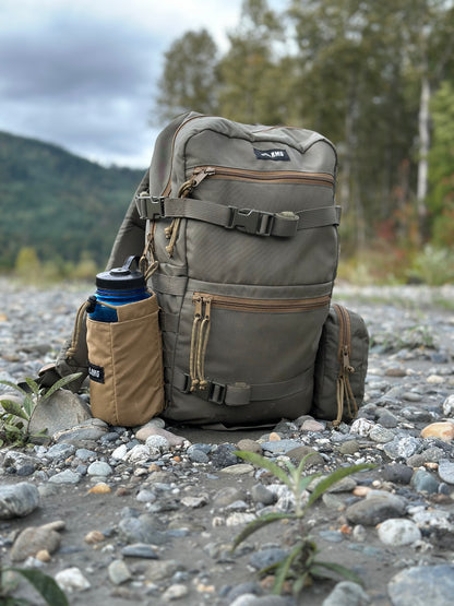 ruckmule molle modular water bottle pouch attached to backpack
